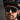 Close-up of a person wearing a helmet and sunglasses with 'Julbo' branding.