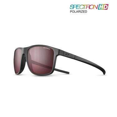 Julbo Eyewear’s The Streets sunglasses feature black frames, red polarized lenses for all-day comfort (Polarized 3.0), with the SPECTRON HD POLARIZED logo in the top right corner. #color_black-with-spectron-3-polarized-hd-lens
