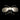 A pair of Julbo Eyewear Sunglass & Goggle Optical Clips for Prescription Inserts are arranged on a black background, their clear plastic frames forming a butterfly shape. #color_adult-goggle-optical-clips-for-prescription-insert