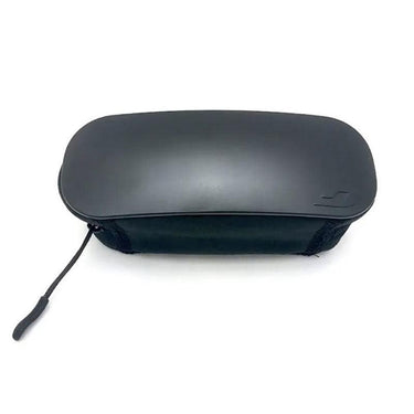 The Julbo Eyewear Collapsible Travel Sunglasses Case is a black, compact hard shell with a zipper and pull tab, shown from above.