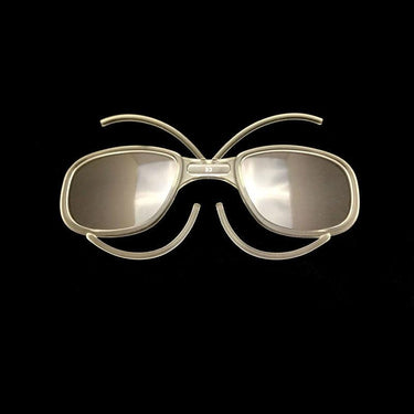 Julbo Eyewear's Sunglass & Goggle Optical Clips for Prescription Inserts are arranged on a black background to create a butterfly shape. #color_junior-goggle-optical-clip-for-prescription-inserts
