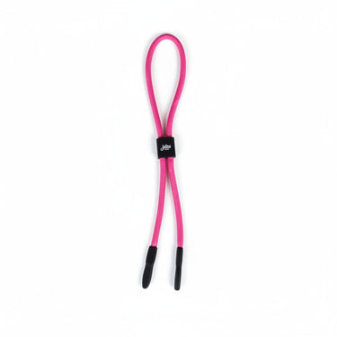Julbo Eyewear Floating Sunglass Cords in pink fabric feature black rubber ends, a black branded tag, and Bouyancy 2.0 Technology, shown isolated on a white background. #color_floating-sunglass-strap-pink