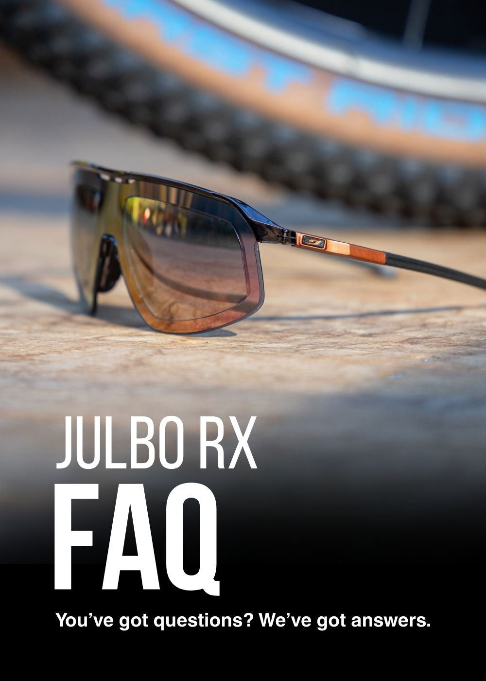 A pair of Julbo RX sunglasses rests on a surface near a bicycle wheel; text below reads Julbo RX FAQ. You’ve got questions? We’ve got answers.