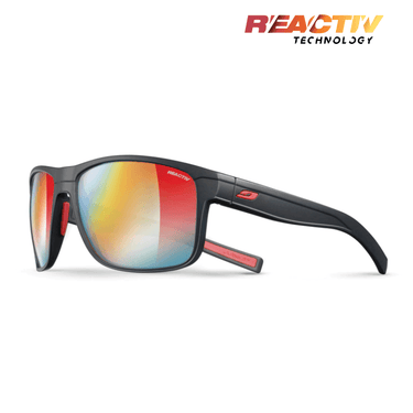 The Julbo-usa Renegade sunglasses feature black frames with red accents, mirrored multicolor REACTIV photochromic lenses, a "REACTIV Technology" logo on the top right lens, and deliver wide-angle vision for any adventure. #color_black-red-with-reactiv-1-3-light-amplifier-lens
