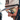 Close-up of a person wearing the Julbo Eyewear Slack Cover with removable shields clipped on, reflective sunglasses, a light-colored hat, and partial facial hair.