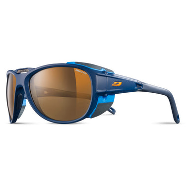 Blue sports sunglasses with brown-tinted lenses, side shields, and a Julbo logo on the temples, shown against a white background.