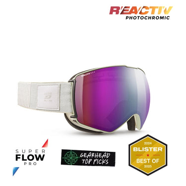Reactiv Photochromic ski goggles with a white strap and a purple-to-blue reflective photochromic lens, shown on a white background with product feature badges. #color_white-with-reactiv-0-4-high-contrast-lens