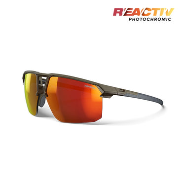 The Julbo Eyewear Liry sunglasses feature a dark frame, adjustable nose fit, and red-orange REACTIV photochromic lenses, shown on a white background with the REACTIV PHOTOCHROMIC logo in the corner. #color_matte-brown-with-reactiv-1-3-light-amplifier-lens