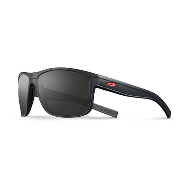 The Julbo Eyewear Renegade RX is a black wraparound prescription sunglass with rectangular polarized Spectron Rx polycarbonate lenses, thick temples, and a small red logo on the arm. Shown on a white background. #color_black-/-red