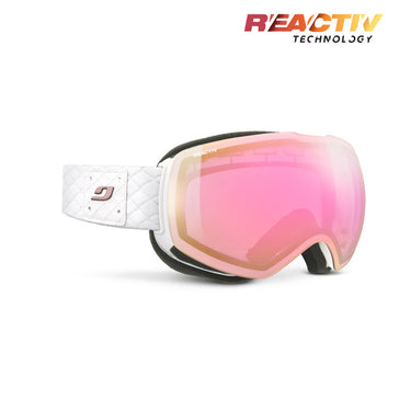 The Julbo-usa Shadow ski goggles feature a white and pink design, photochromic lens, quilted strap, and REACTIV Technology branding in the top right corner. #color_white-with-reactiv-1-3-high-contrast-lens