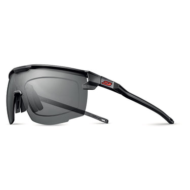 Julbo Eyewear’s Ultimate RX sports sunglasses feature a black frame, rectangular gray lenses, a red logo on the temple, and panoramic lens geometry for enhanced vision, shown against a white background. #color_black-/-red
