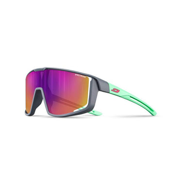 The Julbo-usa Fury S Kids sunglasses feature a sporty gray frame, green arms, and large mirrored purple-orange Spectron lenses—perfect for active youth. #color_grey-mint-with-spectron-3-lens