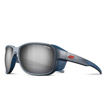 Blue and gray Julbo-usa Montebianco 2 sunglasses feature reflective lenses, a red temple logo, and removable side shields, displayed on a white background. #color_dark-blue-with-spectron-4-lens