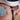 Close-up of a person wearing a bike helmet and reflective sunglasses, with the word SPECTRON3 visible on the lens frame.