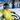 Woman wearing the launcher goggles and riding a ski lift