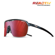 The Julbo Eyewear Frequency sunglasses feature a black shield-style frame, red-tinted photochromic vented lenses for full coverage, and the REACTIV logo in the top right corner. #color_translucent-blue-black-with-reactiv-0-3-high-contrast-lens