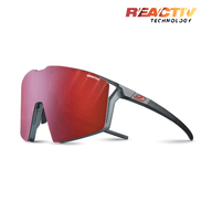 Julbo-usa Edge sunglasses feature a red mirrored single wraparound lens, black frame, REACTIV Technology branding on the top right, and an anti-fog coating for clear vision during intense rides. #color_translucent-black-matte-orange-with-reactiv-0-3-high-contrast-lens