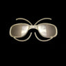 Julbo Eyewear's Sunglass & Goggle Optical Clips for Prescription Inserts are arranged on a black background to create a butterfly shape. #color_junior-goggle-optical-clip-for-prescription-inserts