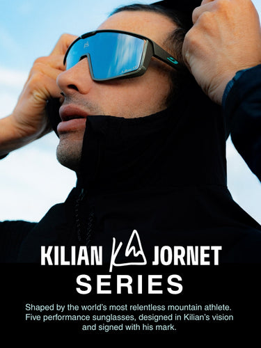 Photo of Julbo athlete Kilian Jornet wearing the Kilian Jornet Fury sunglasses in the mountains, with copy announcing the launch of the Kilian Jornet sunglass series.