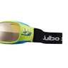 Close-up of sports goggles with a green and blue frame, mirrored lens, and a black Julbo Eyewear Tensing Flight Strap showcasing the brand name.