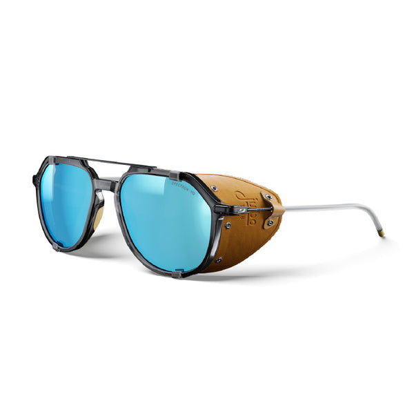A pair of industrial aviator-style sunglasses with bright blue mirrored lenses, a black metal frame, and a tan leather side shield, shown on a white background. #color_black-/-brown-with-spectron-3-hd-polarized-lens