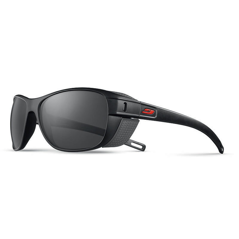 The Julbo Eyewear Camino RX features black wraparound frames with dark lenses, removable side shields, and a red temple logo—ideal as durable, sporty prescription trail sunglasses or for photochromic Rx lens options. #color_black