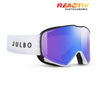 Julbo snow goggles with a white textured strap, black frame, and a blue-to-purple mirrored lens. The JULBO brand name is printed on the strap, and the REACTIV PHOTOCHROMIC logo is visible in the top right corner.  #color_white-black-with-reactiv-1-3-glare-control-lens
