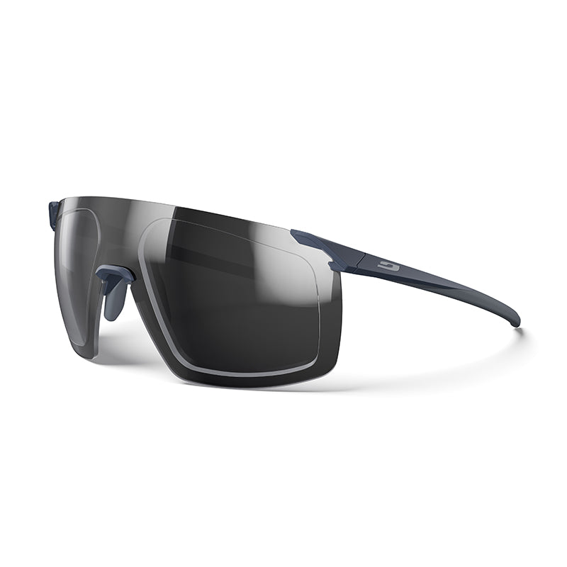 The Julbo Eyewear Faster RX are modern prescription sports sunglasses with large rectangular dark lenses and slim navy blue arms in an aerodynamic mono-lens frame, shown on a white background. #color_matte-dark-gray