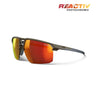 The Julbo Eyewear Liry sunglasses feature a dark frame, adjustable nose fit, and red-orange REACTIV photochromic lenses, shown on a white background with the REACTIV PHOTOCHROMIC logo in the corner. #color_matte-brown-with-reactiv-1-3-light-amplifier-lens
