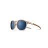 Julbo Eyewear Shine L round sunglasses with light brown frames and blue SPECTRON lenses, displayed at an angle on a white background. #color_blush-/-light-gray-with-polarized-3-lens