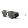 Aviator-style sunglasses with dark gray lenses, a translucent olive green acetate frame, and a silver metal temple arm, shown on a white background. #color_army-green-/-black