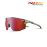 A pair of Julbo-usa Ultimate sport sunglasses with red photochromic panoramic lenses, a dark frame, CustomFIT Temples, and the REACTIV logo in the top right corner. #color_dark-gray-army-green-with-reactiv-0-3-high-contrast-lens