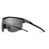 Julbo Eyewear’s Ultimate RX sports sunglasses feature a black frame, rectangular gray lenses, a red logo on the temple, and panoramic lens geometry for enhanced vision, shown against a white background. #color_black-/-red