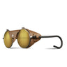 The Julbo-usa Vermont Classic mountaineering glasses feature gold mirrored high-performance lenses, brown leather side shields, and black curved temple arms, shown against a white background. #color_brass-brown-with-spectron-3-lens